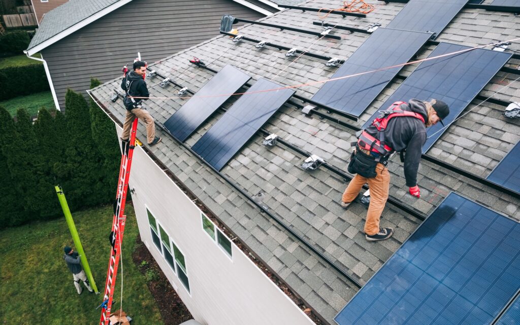 SolQ crew installing solar panels on an Illinois home